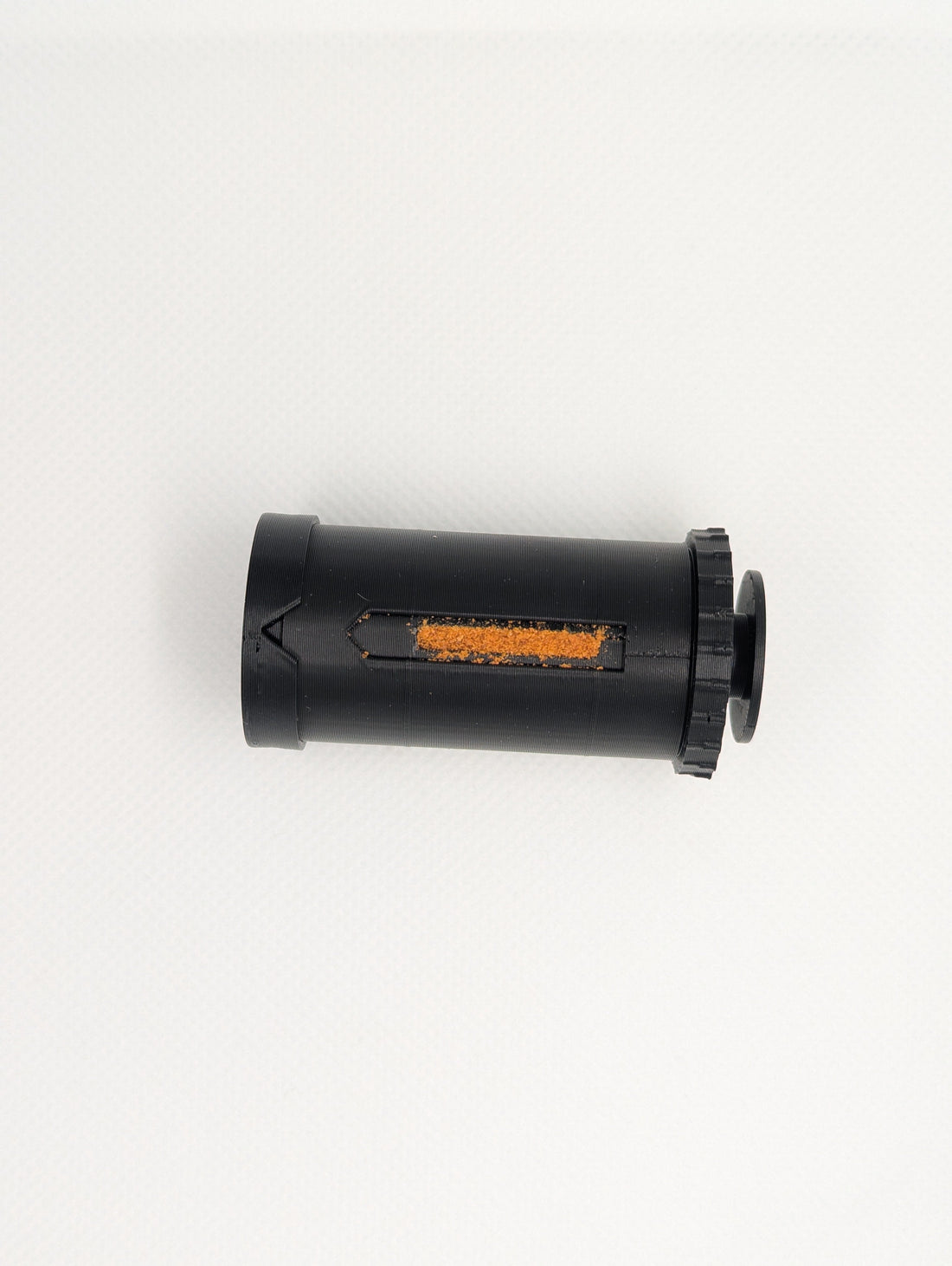 DoseMate Spin Core Black pocket dispenser for carrying sour candy powder neatly